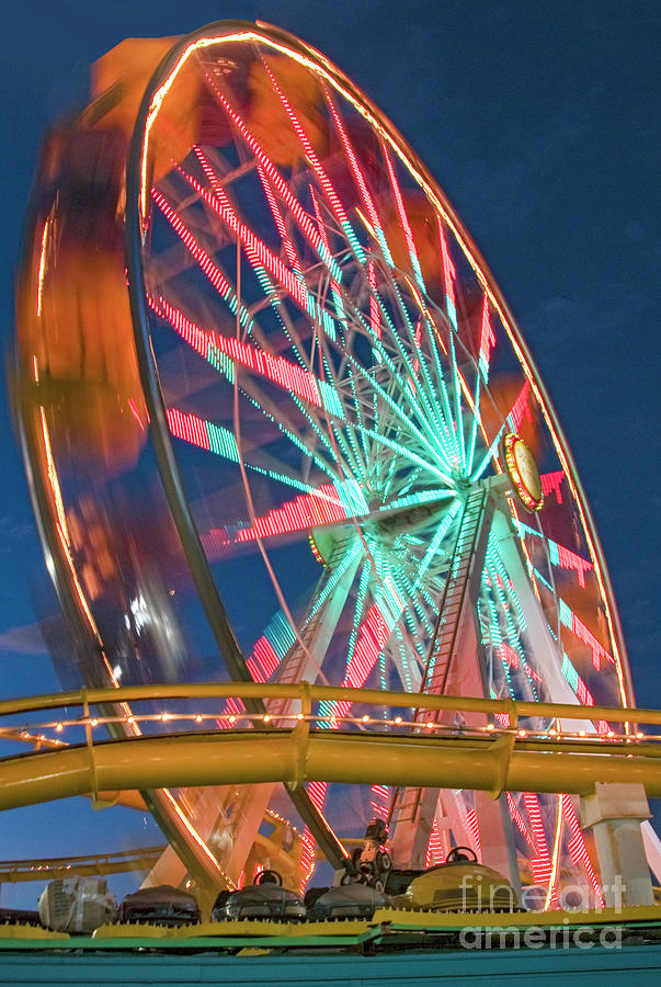 Spinning Ferris Wheel Vertical Photograph by David Zanzinger