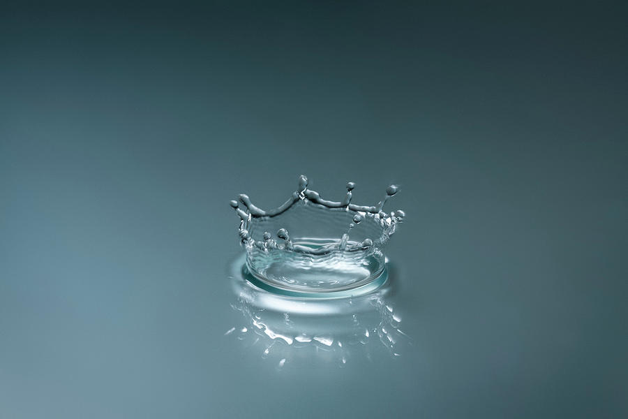 Splash From A Drop Of Water Photograph by Bjorn Holland
