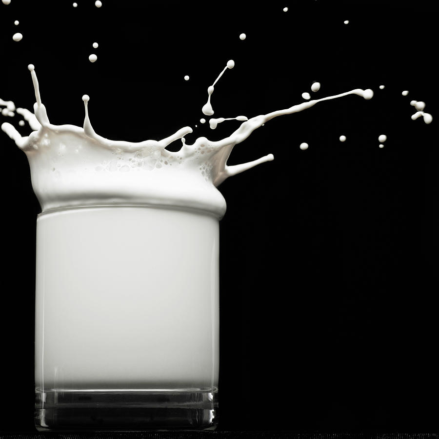 Splashed Milk Photograph by Monica Rodriguez