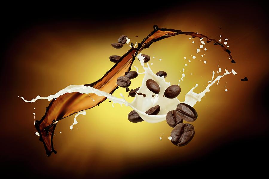 Splashes Of Milk And Coffee With Coffee Beans Photograph by Krger & Gross