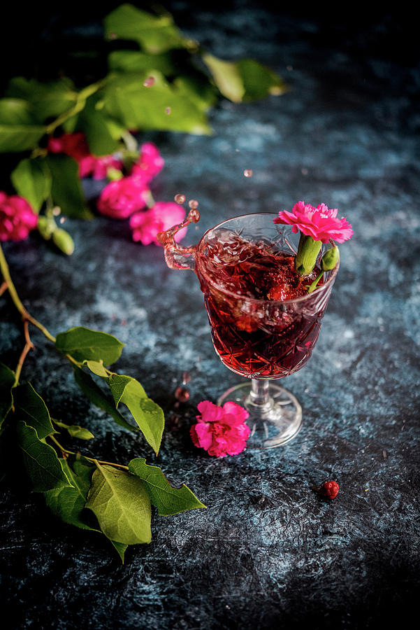 Splashing Glass Of Red Wine Photograph by Diana Kowalczyk