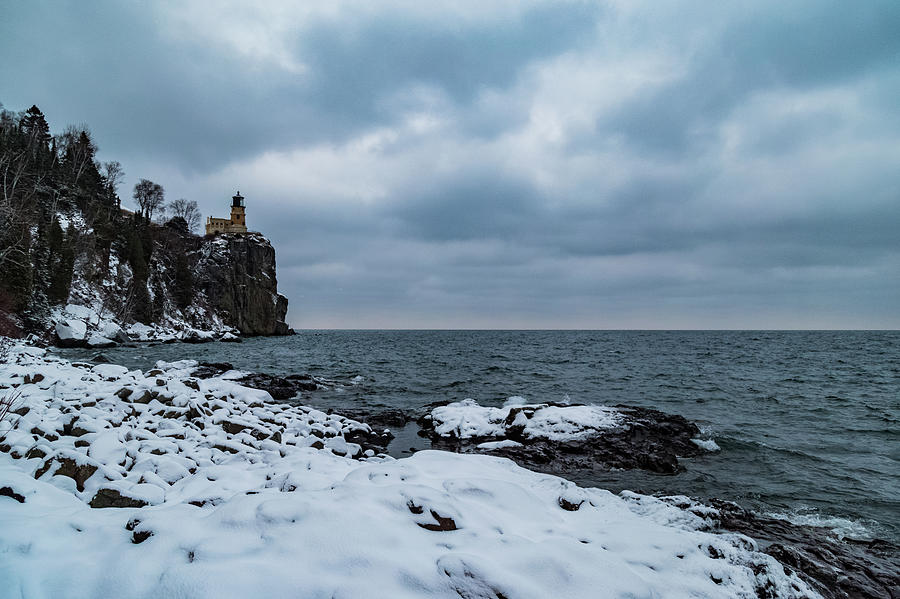 Split Rock in snow Photograph by Joe Kopp