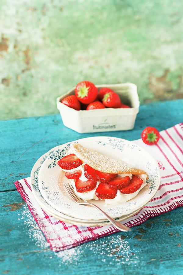 Sponge Cake Omelette With Cream And Strawberries Photograph by Jalag / Wolfgang Schardt