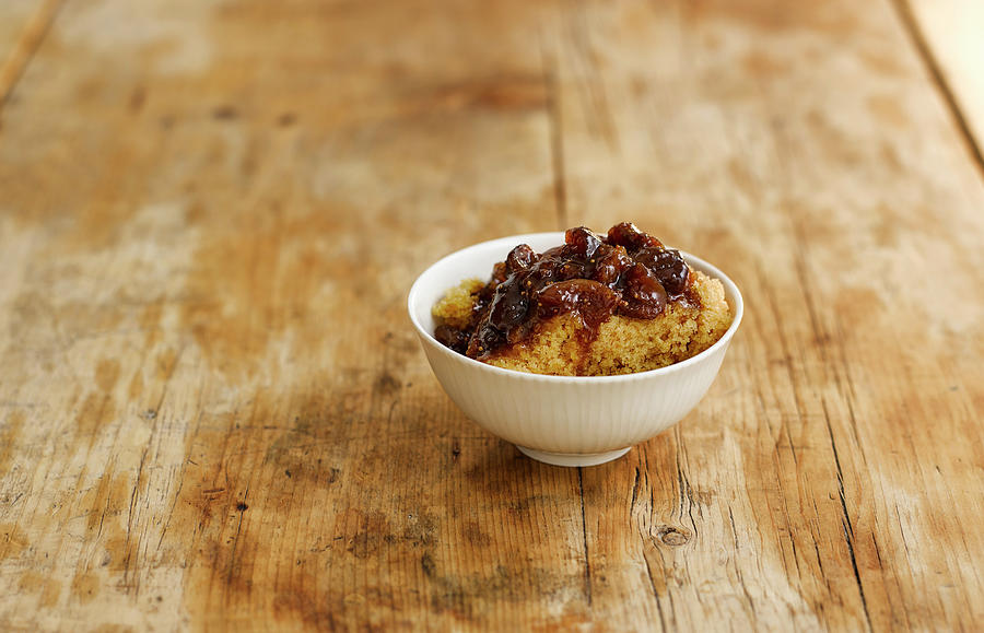 Sponge Pudding With Caramelised Figs In A Bowl Photograph by Gareth Morgans