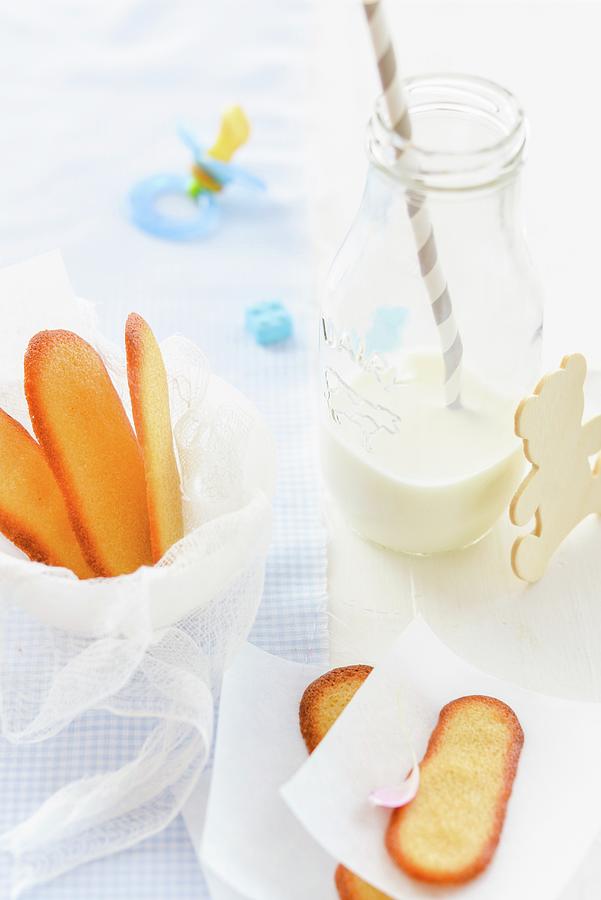 Sponges Fingers And A Bottle Of Milk As Baby Food Photograph by Au Petit Gout Photography Llc
