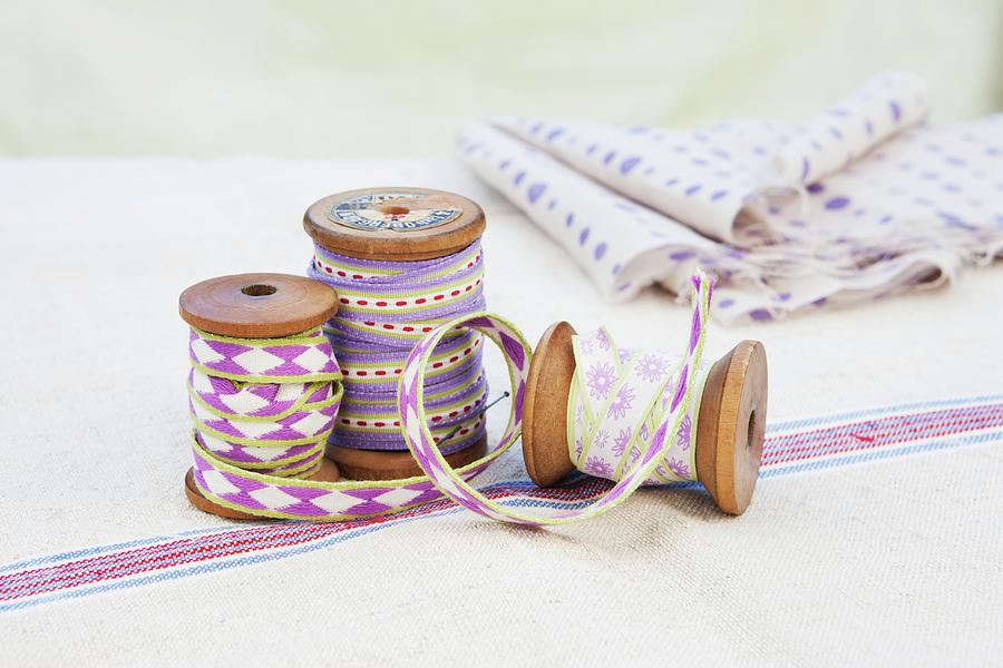 Spools Of Decorative Ribbon Photograph by Sabine Lscher