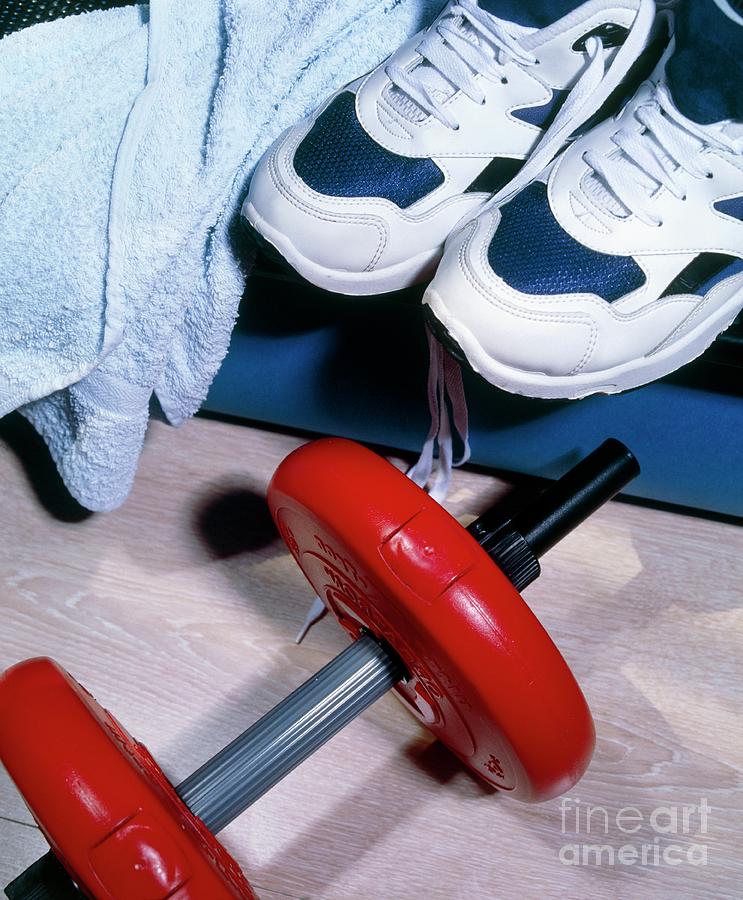 Sport Equipment: Training Shoes And Dumbell Photograph by Victor Habbick Visions/science Photo Library