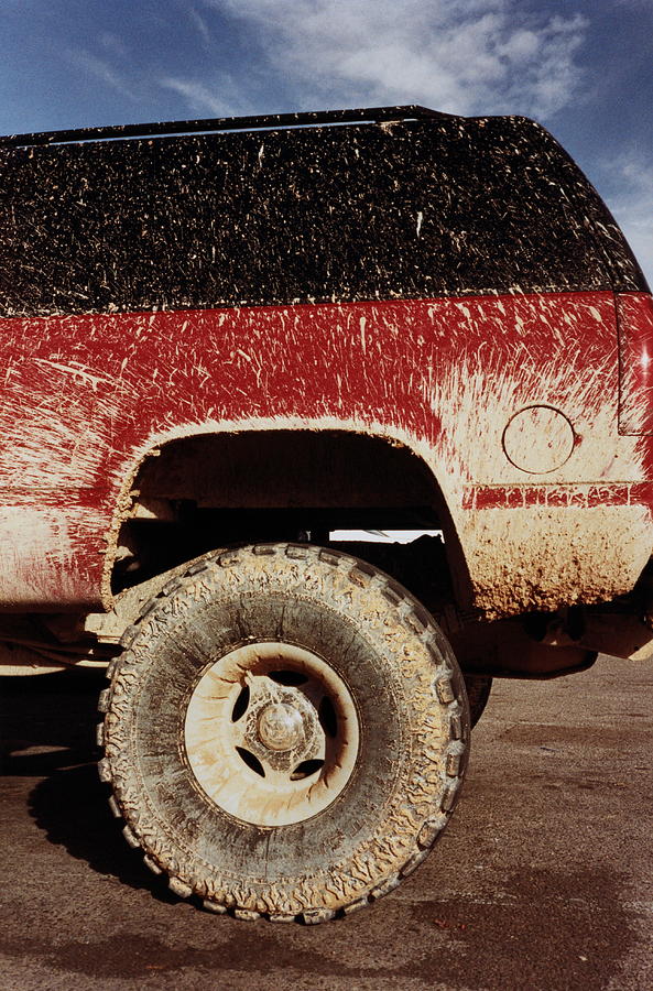 Sports Utility Vehicle With Mud Photograph by Cat Gwynn