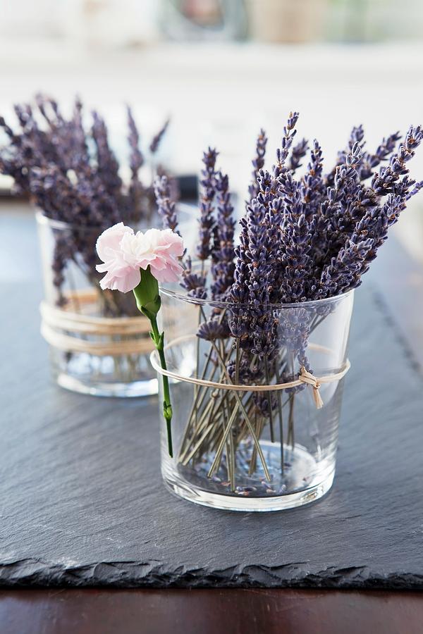 Sprays Of Lavender Flowers In Glass Holders As Table Decorations Photograph by Pia Simon