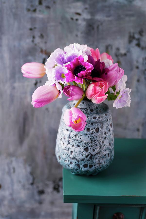 Spring Arrangement Of Tulips, Poison Primroses And Anemones Photograph by Mandy Reschke