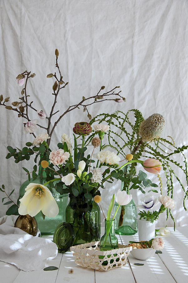 Spring Bouquet Of Banksia, Tulips, Ranunculus, Carnations, Freesias, Branches Of Magnolia And Eucalyptus Photograph by Elisabeth Berkau