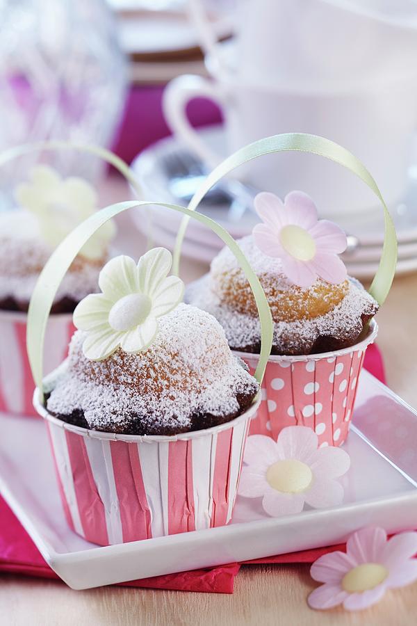 Spring Muffins Decorated With Rice Paper Flowers In Paper Cases With Handles Photograph by Franziska Taube