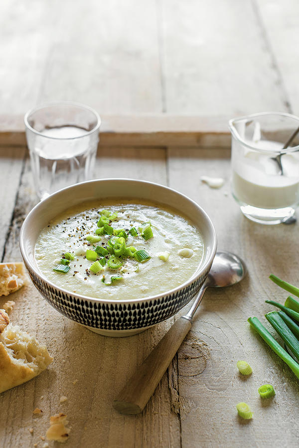 Spring Onion And Potato Soup With Cream And Black Pepper Photograph by Magdalena Hendey
