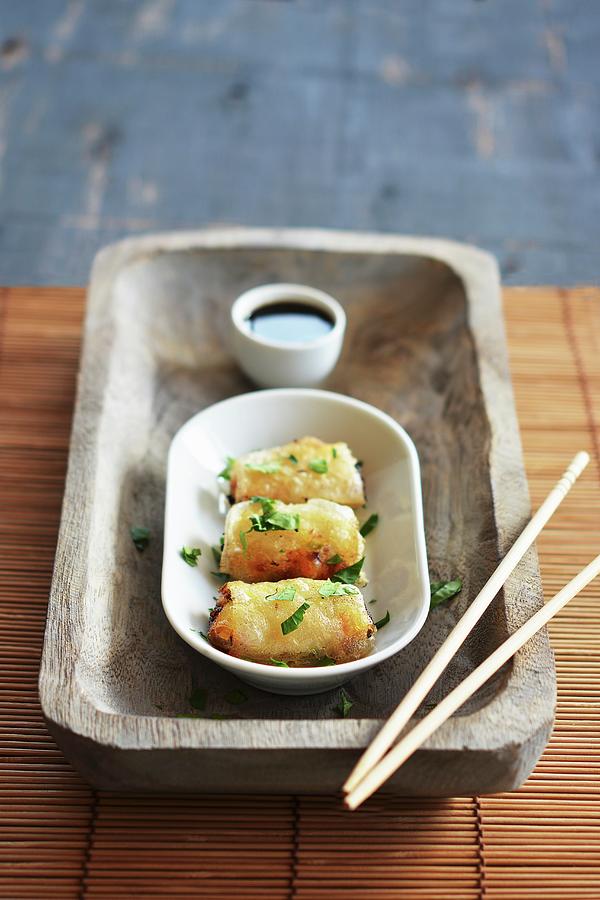 Spring Rolls In A Bowl With Soy Sauce On A Rustic Tray With Chopsticks Photograph by Mariola Streim