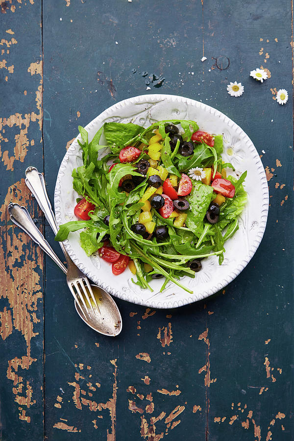 Spring Salad With Rocket, Pepper, Tomatoes And Olives Photograph by Meike Bergmann