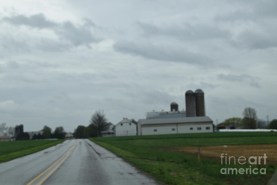 Spring Storm Clouds Roll Over an Amish Farm Photograph by Christine Clark