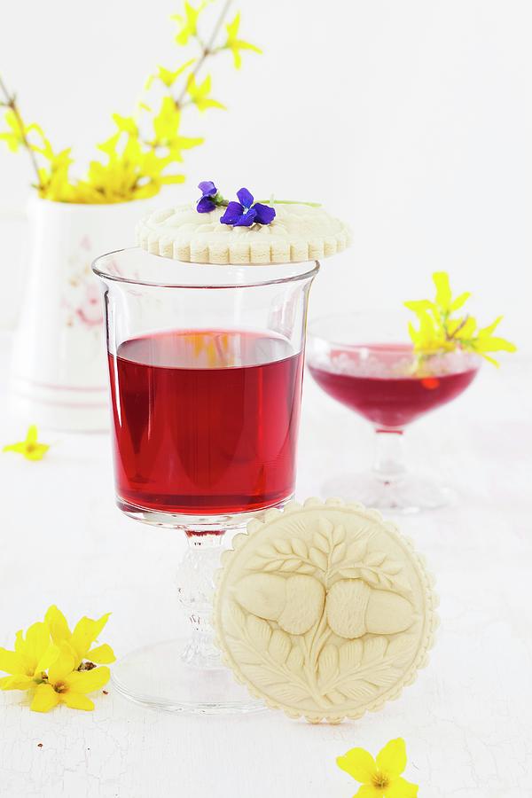 Springerle anise Biscuits With An Embossed Design With Spring Flowers And Strawberry Wine Photograph by Yelena Strokin