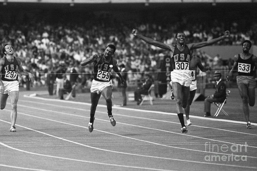 Sprinter Tommie Smith Winning 200-meter Photograph by Bettmann