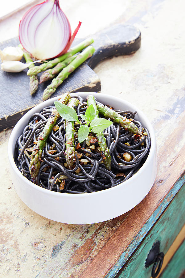 Squid Ink Spaghetti With Green Asparagus And Onions Photograph by Chez Elles