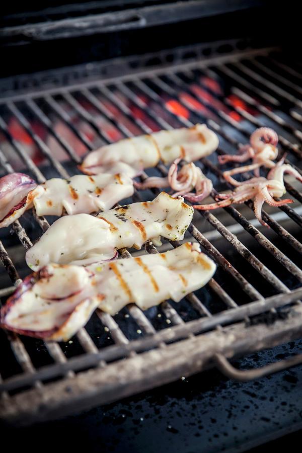 Squid On A Barbecue Photograph by Imagerie
