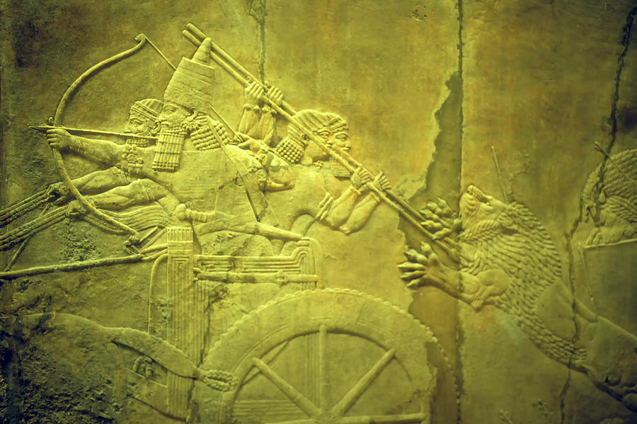 Assyrian archers on ancient stone bas relief  Photograph by Steve Estvanik