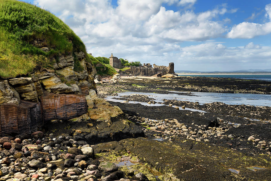 St Andrews Castle ruins with wall to rocky ocean with tide pools Photograph by Reimar Gaertner