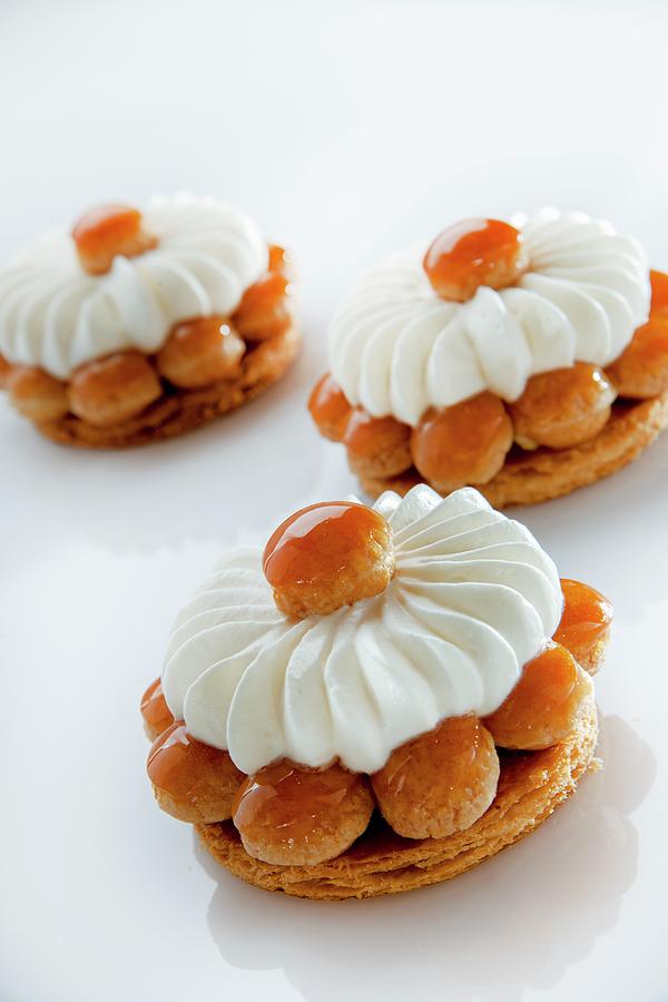 St. Honore Cakes With Honey Photograph by Christophe Madamour