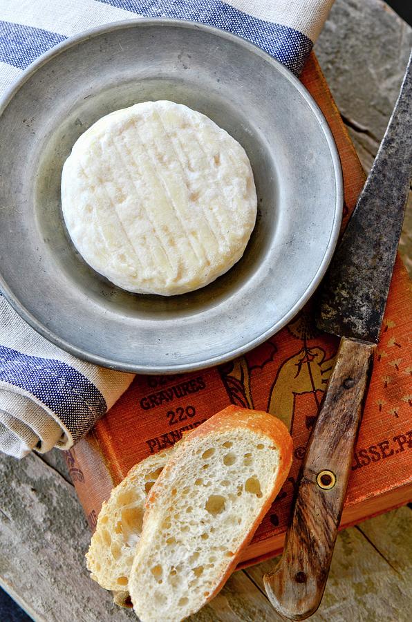 St. Marcellin Cheese On A Pewter Plate With Baguette Photograph by Jamie Watson