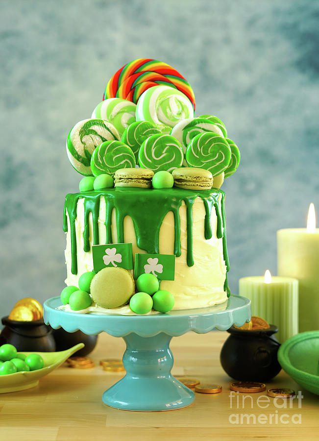St Patricks Day candyland drip cake and party table. Photograph by Milleflore Images