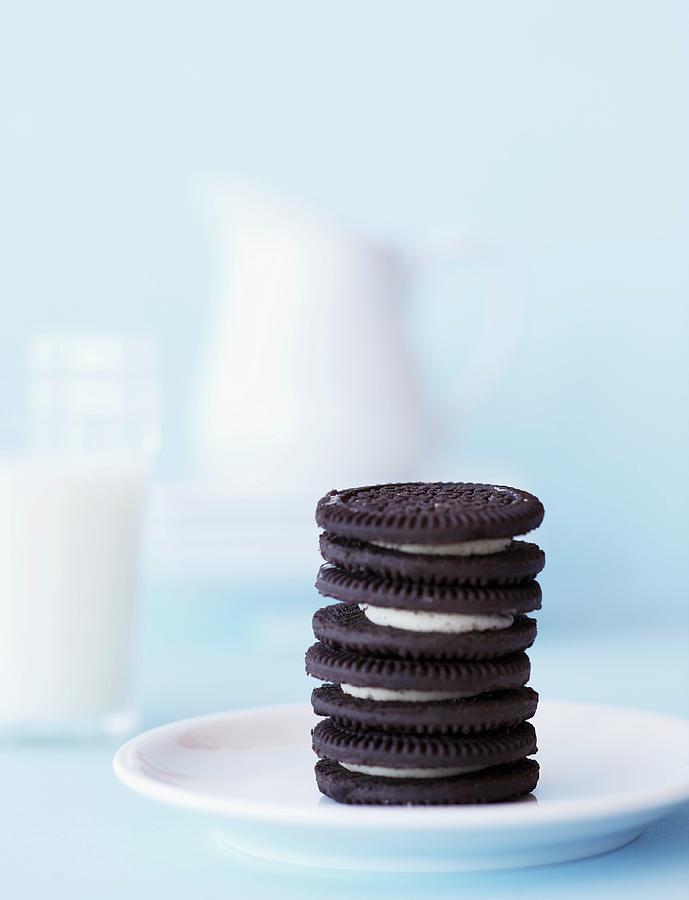 Stack Of Oreos And Glass Of Milk Photograph by Katharine Pollak