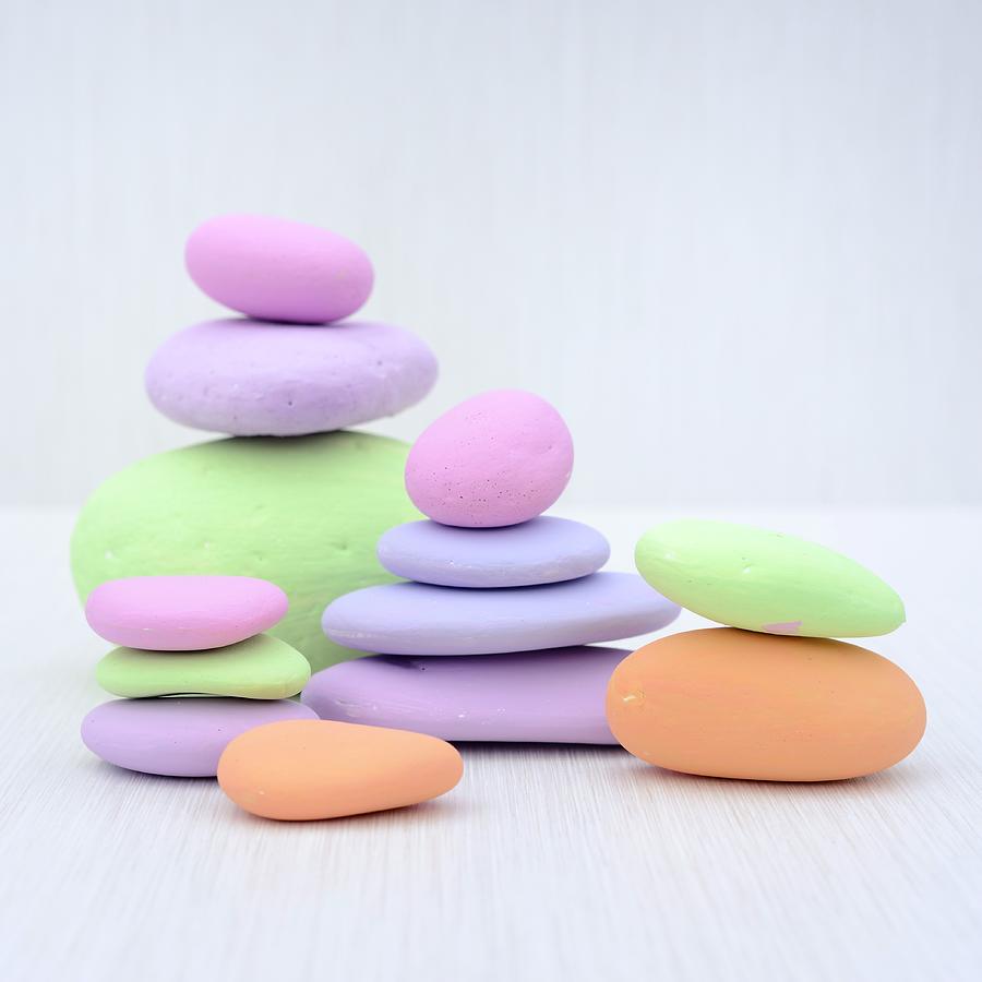 Stacked Pebbles Painted In Pastel Colours Photograph by Sonia Chatelain
