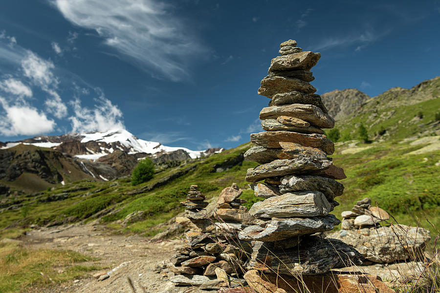 Stacked Stones In Martell Valley In South Tyrol On A Sunny Day In Summer Photograph