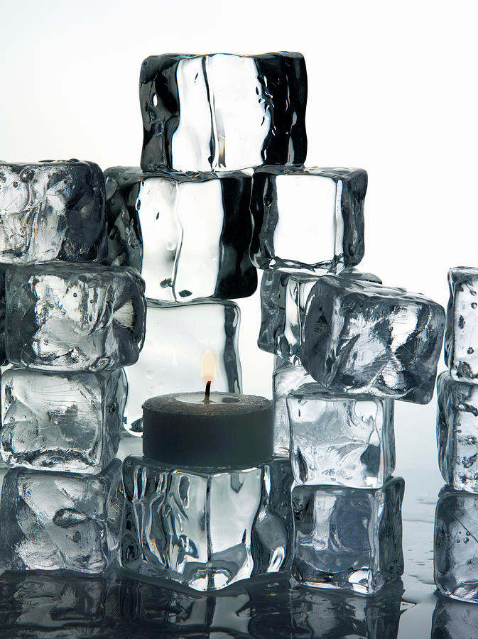 Stacks Of Ice Cubes And Candle Photograph by Walter Zerla