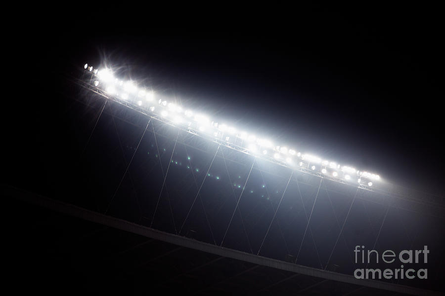 Stadium Floodlights At Night Time Photograph by Xixinxing
