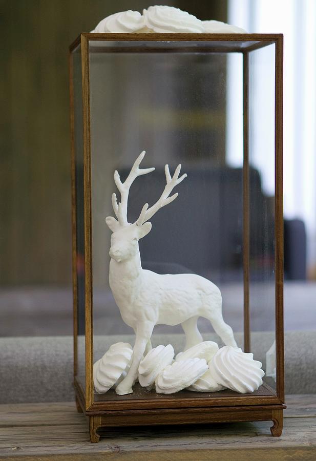 Stag Figurine Dipped In Plaster And Arranged With Meringues In Glass Case Photograph by Olga Serrarens