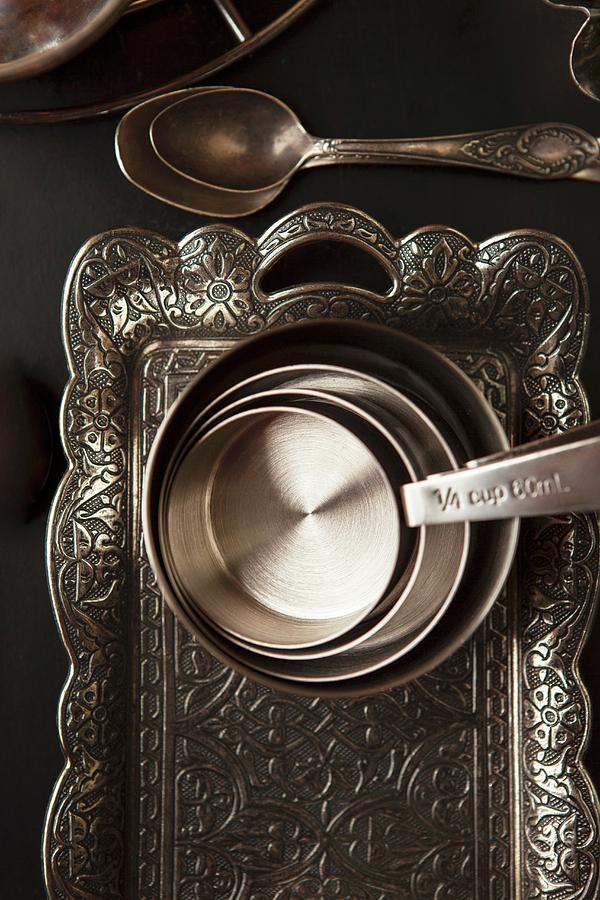 Stainless Steel Measuring Cups On A Metal Tray Photograph by Nika Moskalenko
