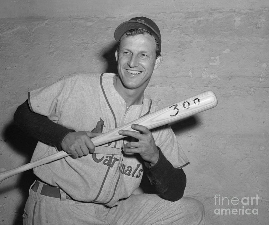 Stan Musial Holding Baseball Bat by Bettmann