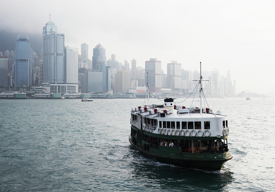 Star Ferry In Victoria Harbour,hong Kong Photograph by Gary Yeowell