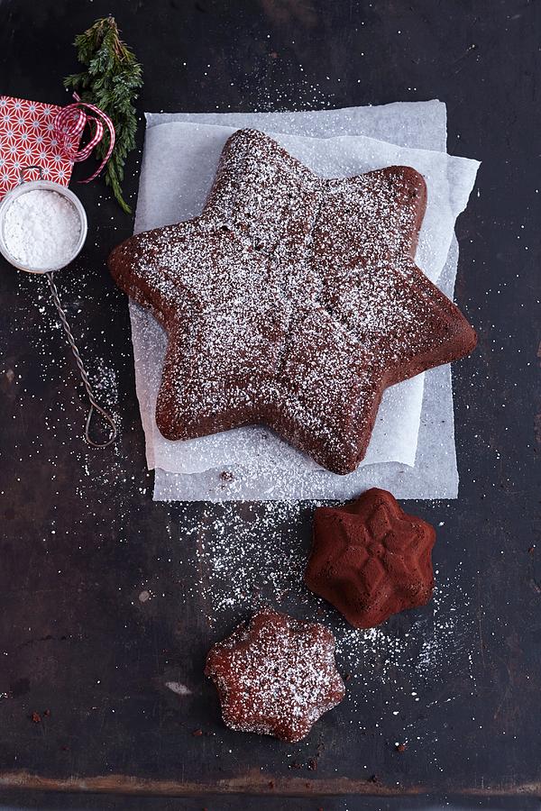 Star Shaped Advent Cakes Dusted With Icing Sugar Photograph by Anke Schtz
