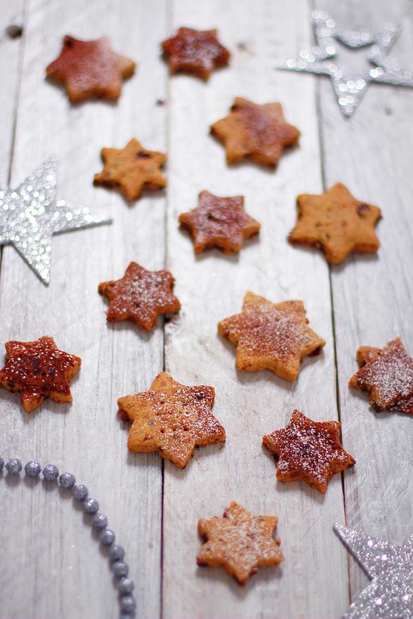 Star-shaped Biscuits With Cinnamon And Icing Sugar For Christmas ...