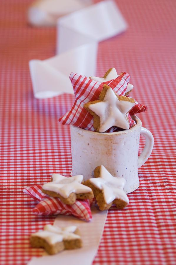 Star-shaped Cinnamon Biscuits And Fabric Stars In A Mug Photograph by Sass, Achim