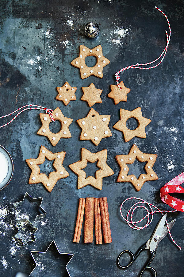 Star-shaped Gingerbread Placed In The Shape Of A Christmas Tree Photograph by Brigitte Sporrer