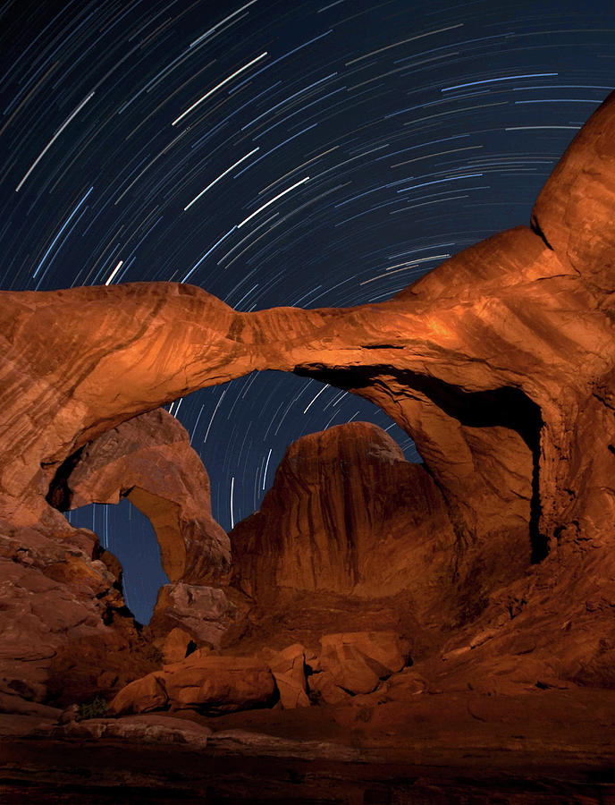 Star Trails Over Double Arch Photograph by Mel Cabeen