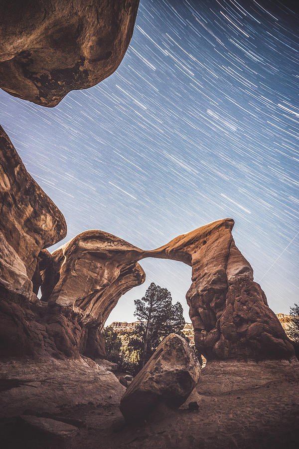 Star trails over Metate Arch Photograph by Mati Krimerman