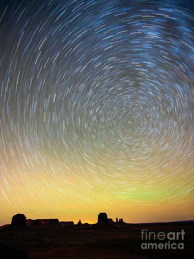 Nature Photograph - Star Trails over Monument Valley by Jim Chamberlain