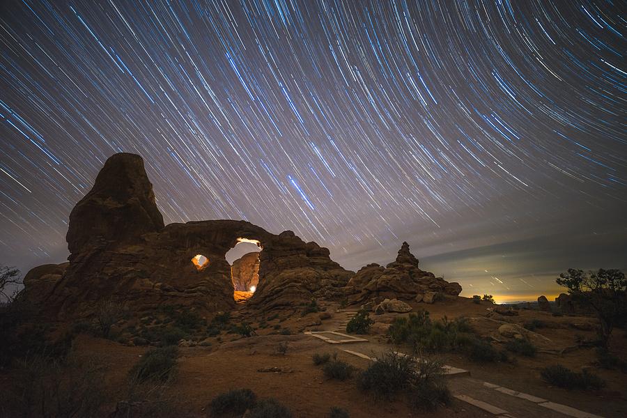 Star trails over Turret Arch Photograph by Mati Krimerman