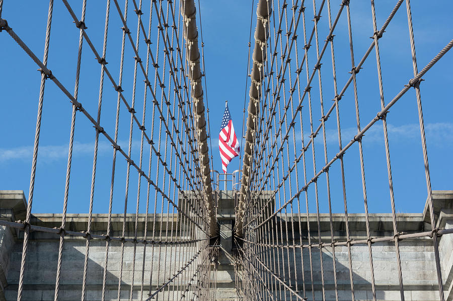 Stars and Stripes Between Cables on the Brooklyn Bridge Photograph by Mark Hunter