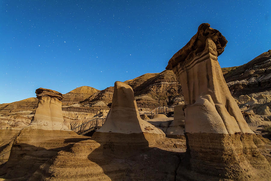 Stars Over The Hoodoos In The Red Deer Photograph by Alan Dyer/stocktrek Images