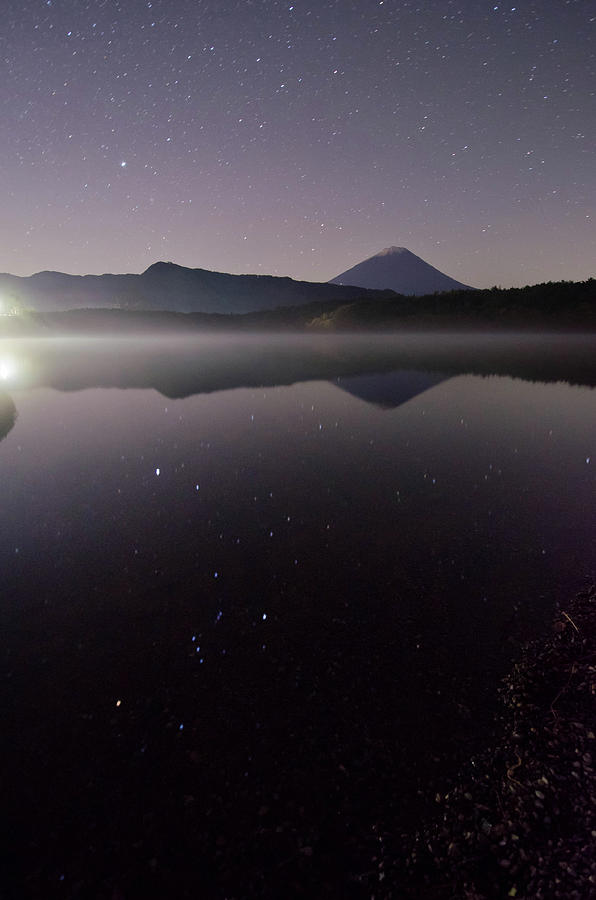Stars Reflection On Surface Of Water Photograph by Noriakimasumoto