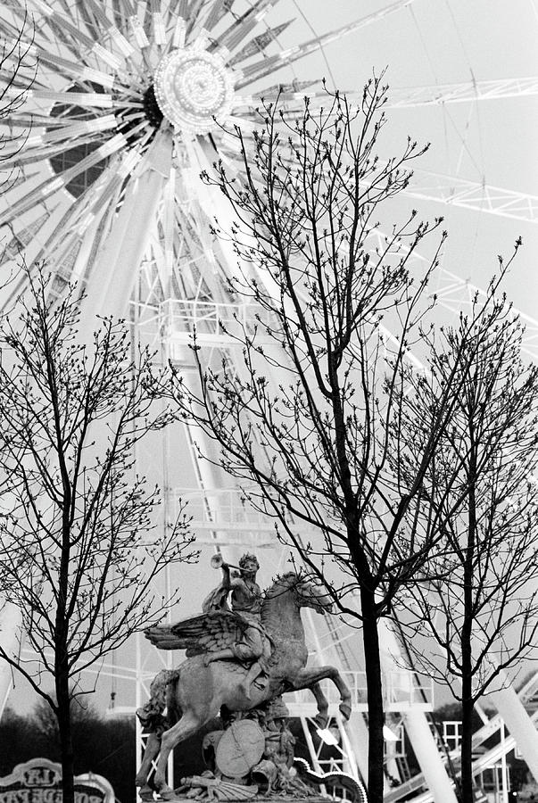 Statue And Ferris Wheel, Jardin Des Photograph by Walter Bibikow